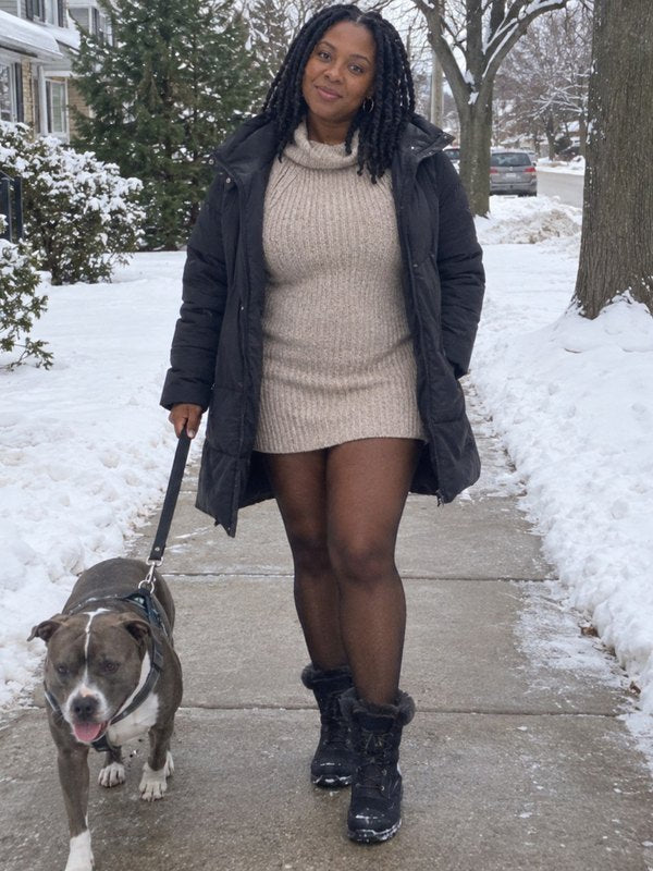 Tasha in the Caramel shade walking her dog in the snow